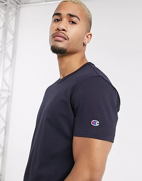 Champion – Marineblaues T-Shirt mit Logo an den Ärmeln günstig online kaufen
