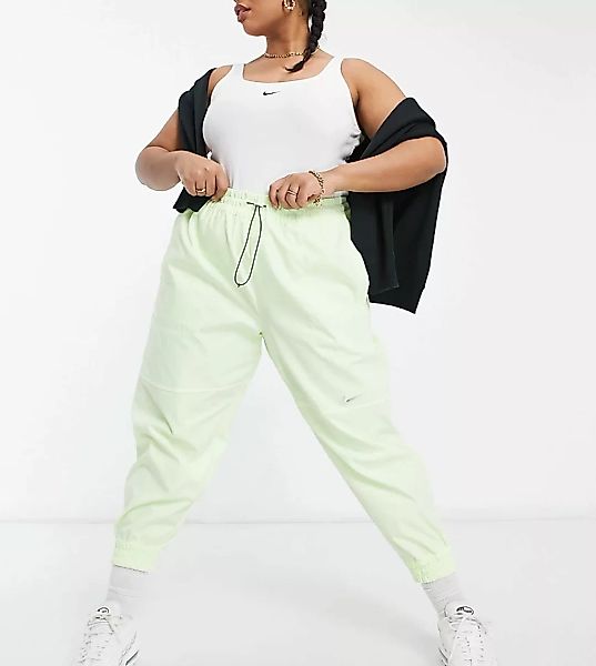 Nike Plus – Gewebte Hose mit Swoosh-Logo in Neongelb günstig online kaufen
