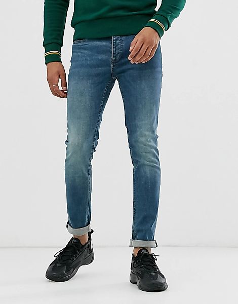 Topman – Eng geschnittene Jeans mit Stretch in mittlerer Waschung-Blau günstig online kaufen