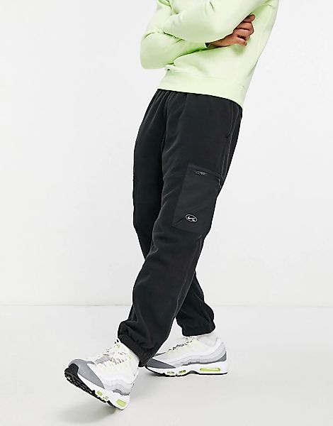 Nike – SB Therma-FIT Winterized – Jogginghosen aus Polarfleece mit Cargotas günstig online kaufen