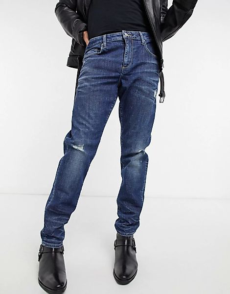 ASOS DESIGN – Enge Stretch-Jeans mit Abnutzungseffekt in Dunkelblau, Qualit günstig online kaufen