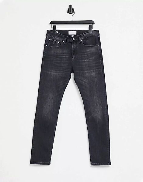 Calvin Klein Jeans – Eng geschnittene Jeans in verwaschenem Schwarz günstig online kaufen