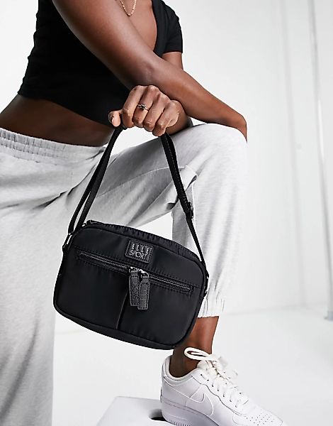 Elle Sport – Umhängetasche aus Nylon in Schwarz mit zwei Taschen günstig online kaufen