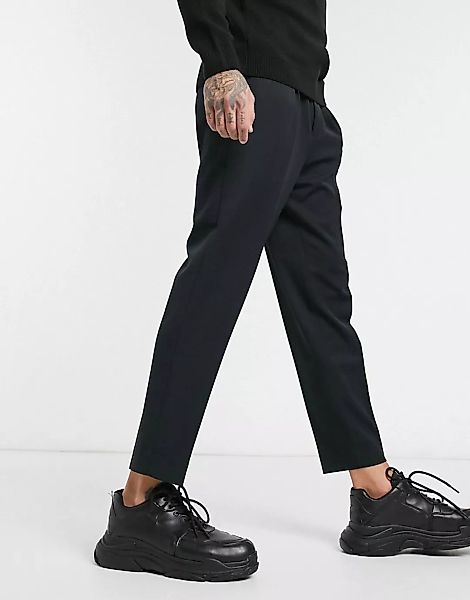 ASOS DESIGN – Elegante, schmal zulaufende Hose in Schwarz günstig online kaufen