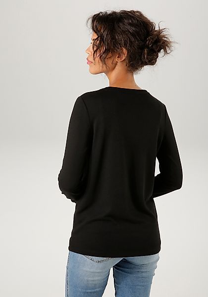 Aniston CASUAL Langarmshirt mit Glitzersteinchen im silberfarbenem Frontdru günstig online kaufen