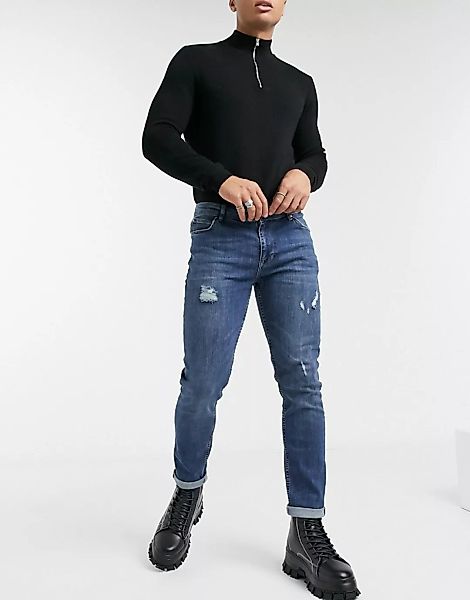 ASOS DESIGN - Enge Jeans im Used-Look in dunkelblauer Vintage-Waschung günstig online kaufen