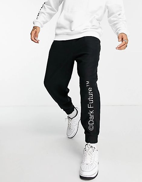 ASOS – Dark Future – Locker geschnittene Jogginghose aus Polarfleece in Sch günstig online kaufen