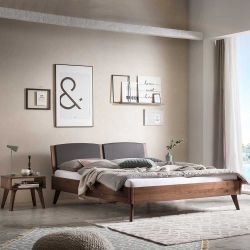 Doppelbett mit Polster Kopfteil aus Nussbaum Massivholz optionale Nachtkons günstig online kaufen