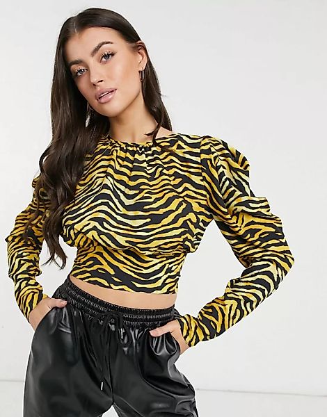 ASOS DESIGN – Langärmlige Bluse mit voluminösen Ärmeln und Tigerprint-Mehrf günstig online kaufen
