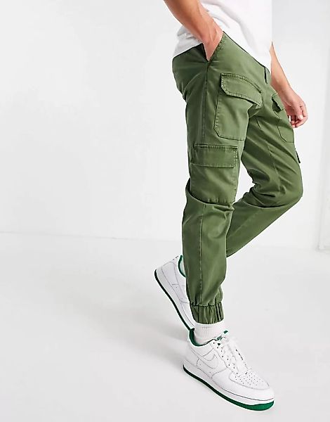 ASOS DESIGN – Schmal zulaufende Hose in Khaki mit mehreren Taschen-Grün günstig online kaufen