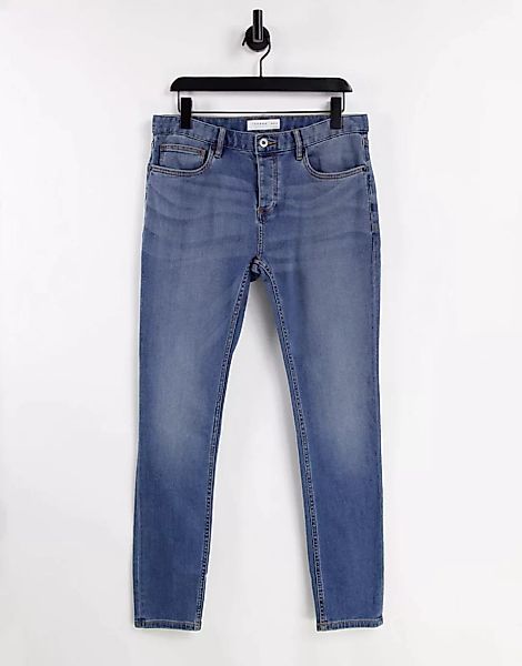 Topman – Hautenge Jeans aus Bio-Baumwollmix in mittlerer Waschung-Blau günstig online kaufen