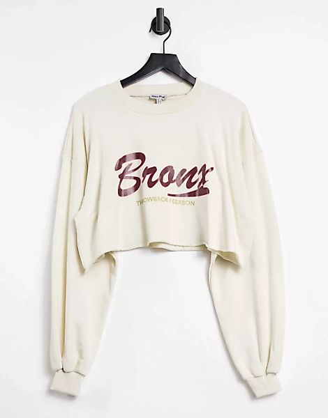Public Desire – Kurzes Sweatshirt mit Motiv in Weiß günstig online kaufen