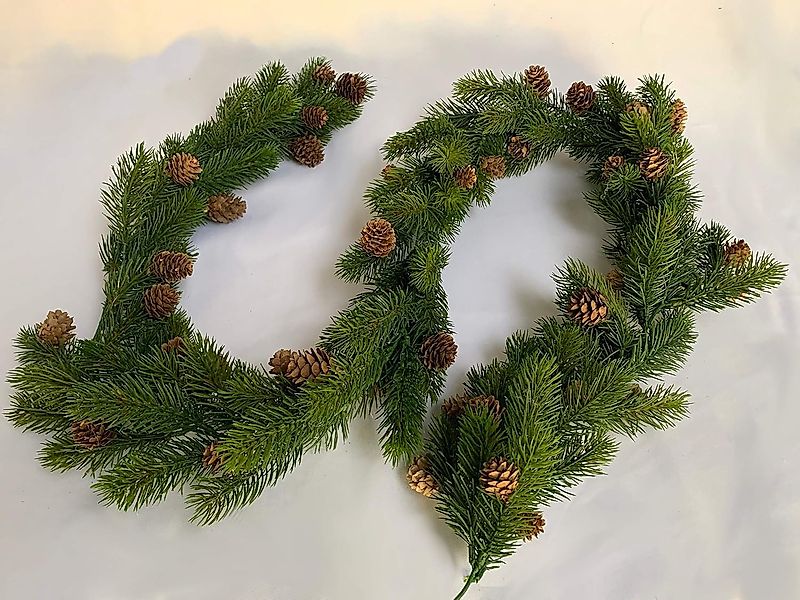 Winterliche Kunstpflanze Tannengirlande mit echten Zapfen günstig online kaufen