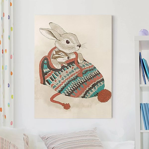 Leinwandbild Tiere - Hochformat Illustration Kuschelnder Hase in Mütze günstig online kaufen