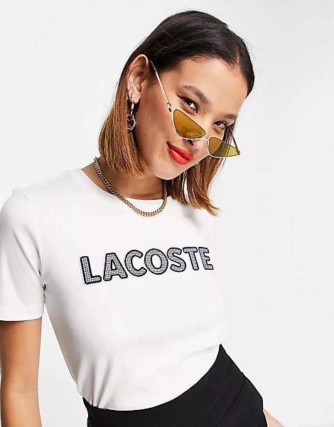 Lacoste – T-Shirt mit Logo-Schriftzug in Creme-Weiß günstig online kaufen