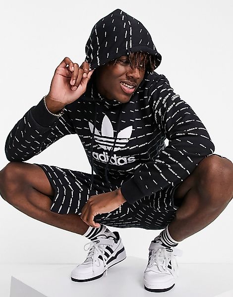 adidas Originals – Repeat – Schwarzer Kapuzenpullover mit Logo günstig online kaufen