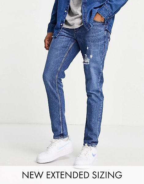 ASOS DESIGN – Schmal geschnittene Stretch-Jeans in verwaschenem Dunkelblau günstig online kaufen