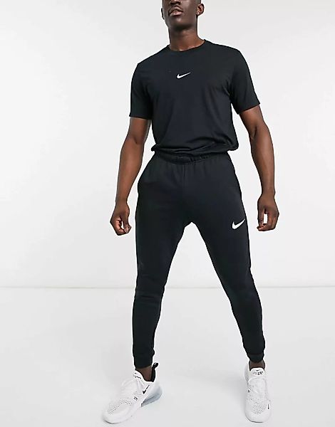 Nike Training – Dri-Fit – Schmal zulaufende Fleece-Jogginghose in Schwarz günstig online kaufen