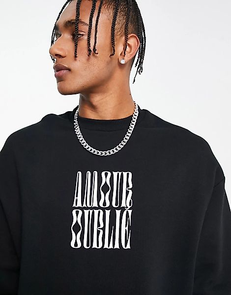 ASOS DESIGN – Oversize-Sweatshirt in Schwarz mit „Amour“-Schriftzug günstig online kaufen
