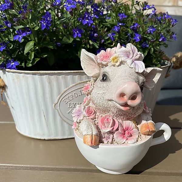 Online-Fuchs Gartenfigur süßes Schwein mit Blumen günstig online kaufen