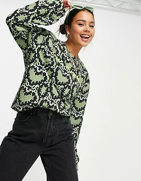 Love Moschino – Sweatshirt mit All-over-Herzmuster in Grün günstig online kaufen