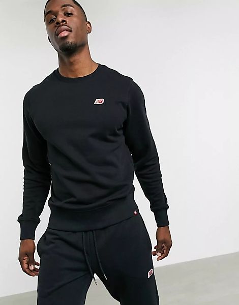 New Balance – Schwarzes Sweatshirt mit kleinem Logo günstig online kaufen