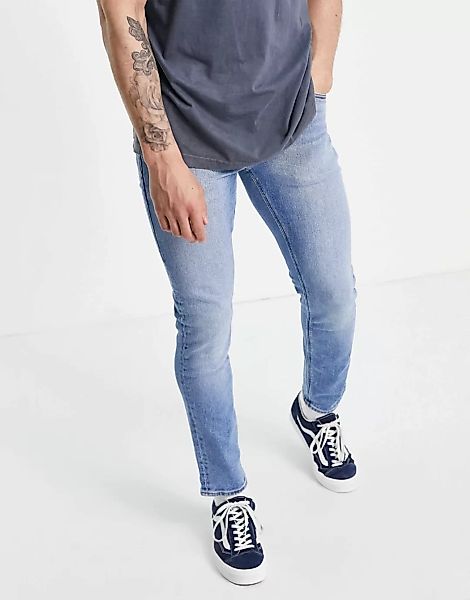 ASOS DESIGN – Schmale Stretch-Jeans in heller Vintage-Waschung-Blau günstig online kaufen