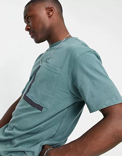 Another Influence – Kastenförmiges Oversize-Shirt mit Tasche in Blaugrün-Ma günstig online kaufen