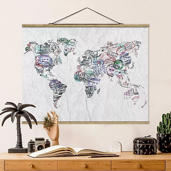 Stoffbild Karten mit Posterleisten - Querformat Reisepass Stempel Weltkarte günstig online kaufen