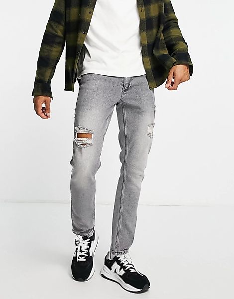 ASOS DESIGN – Schmal geschnittene Stretch-Jeans in verwaschenem Grau mit Ab günstig online kaufen