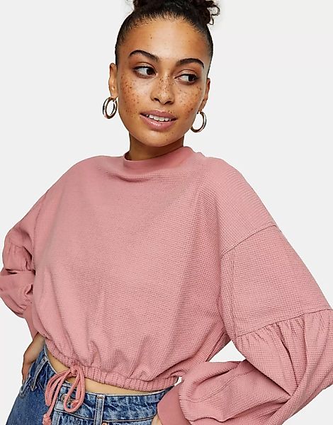 Topshop – Sweatshirt in Rosa mit Waffelstruktur und Schnürung an der Taille günstig online kaufen