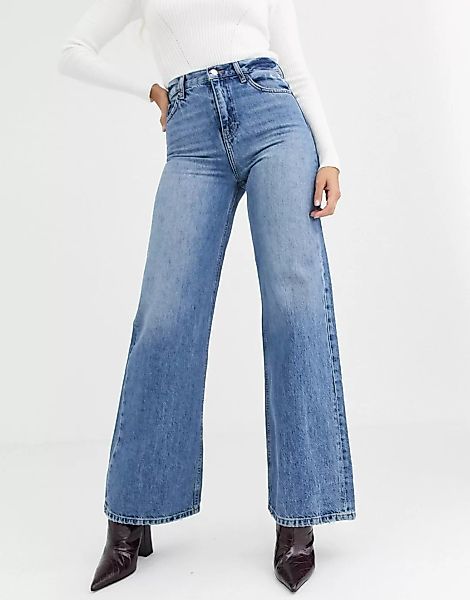 Topshop – Jeans mit weiten Beinen in verwaschenem Mittelblau günstig online kaufen