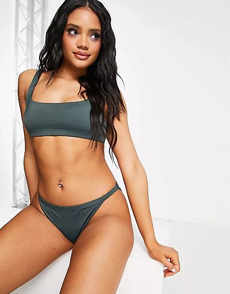 Weekday – Ava – Tanga-Bikinihose aus recyceltem Nylon in Grün günstig online kaufen