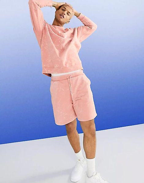 ASOS DESIGN – Oversize-Shorts aus Jersey in pfirsichfarbener Acid-Waschung, günstig online kaufen