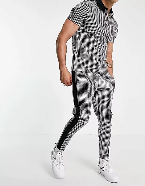 ASOS DESIGN – Schmal geschnittene Jogginghose mit elegantem Hahnentrittmust günstig online kaufen