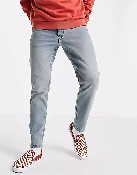 ASOS DESIGN – Schmal zulaufende Stretch-Jeans in heller, getönter Waschung- günstig online kaufen