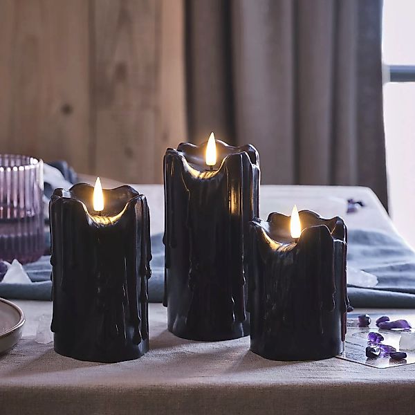 3er Set TruGlow® LED Stumpenkerzen Echtwachs schwarz mit Wachstropfen günstig online kaufen