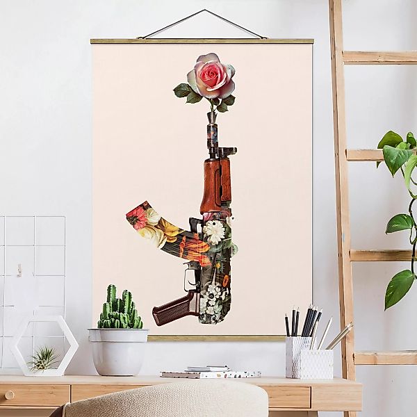 Stoffbild Blumen mit Posterleisten - Hochformat Waffe mit Rose günstig online kaufen