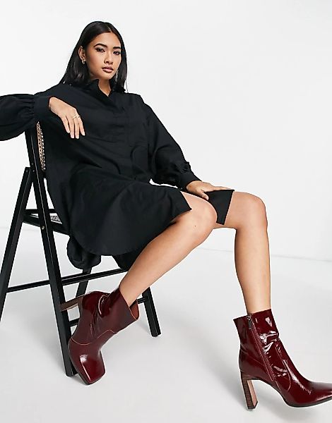 Vero Moda – Longline-Hemd aus Bio-Baumwolle in Schwarz mit voluminösen Ärme günstig online kaufen