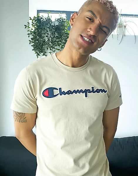 Champion – T-Shirt mit kleinem Logo-Schriftzug in Beige-Neutral günstig online kaufen