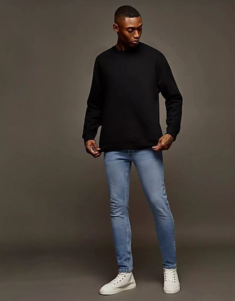 Topman – Eng geschnittene Jeans mit Stretch in heller Waschung-Blau günstig online kaufen