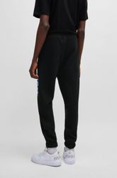 HUGO Blue Jogginghose "Nuram" mit großem Logo-Print günstig online kaufen