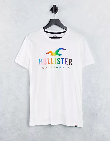 Hollister – Pride Capsule – T-Shirt in Weiß mit Regenbogen-Logo günstig online kaufen
