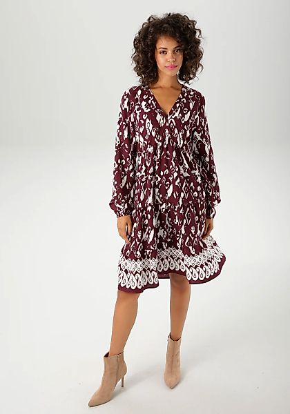 Aniston CASUAL Tunikakleid mit kunstvollem Druck und Bordüre am Saum günstig online kaufen
