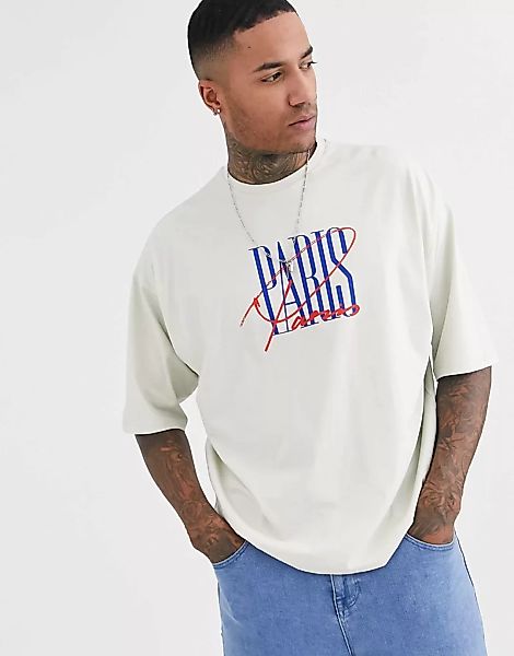 ASOS DESIGN – Oversize-T-Shirt in gebrochenem Weiß mit „Paris”-Cityprint-Gr günstig online kaufen