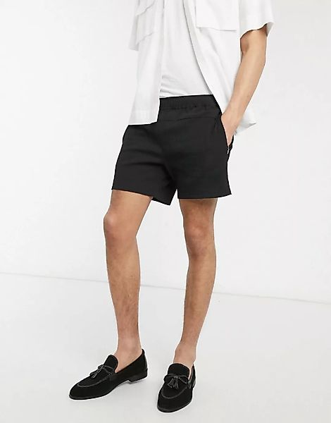 ASOS DESIGN – Schmale, kurz geschnittene Seersucker-Shorts in Schwarz günstig online kaufen