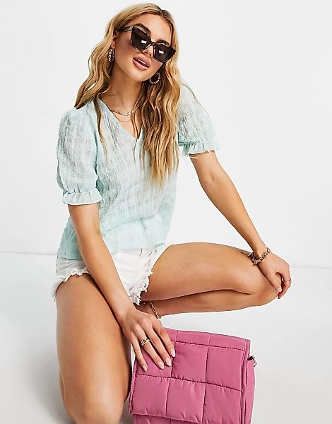 Vero Moda – Bluse in Minzgrün mit V-Ausschnitt günstig online kaufen