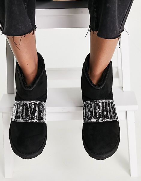 Love Moschino – Flache Stiefel aus schwarzem Wildleder mit Logo günstig online kaufen