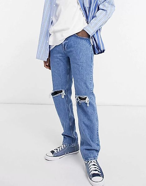 ASOS DESIGN – Jeans in originaler Passform und mittlerer Waschung mit Risse günstig online kaufen
