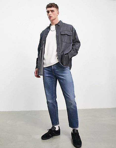 ASOS DESIGN – Oversize-Jeanshemd mit Vintage-Waschung in Schwarz-Grau günstig online kaufen